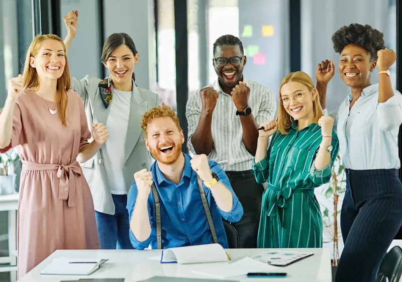 Team celebrating business success